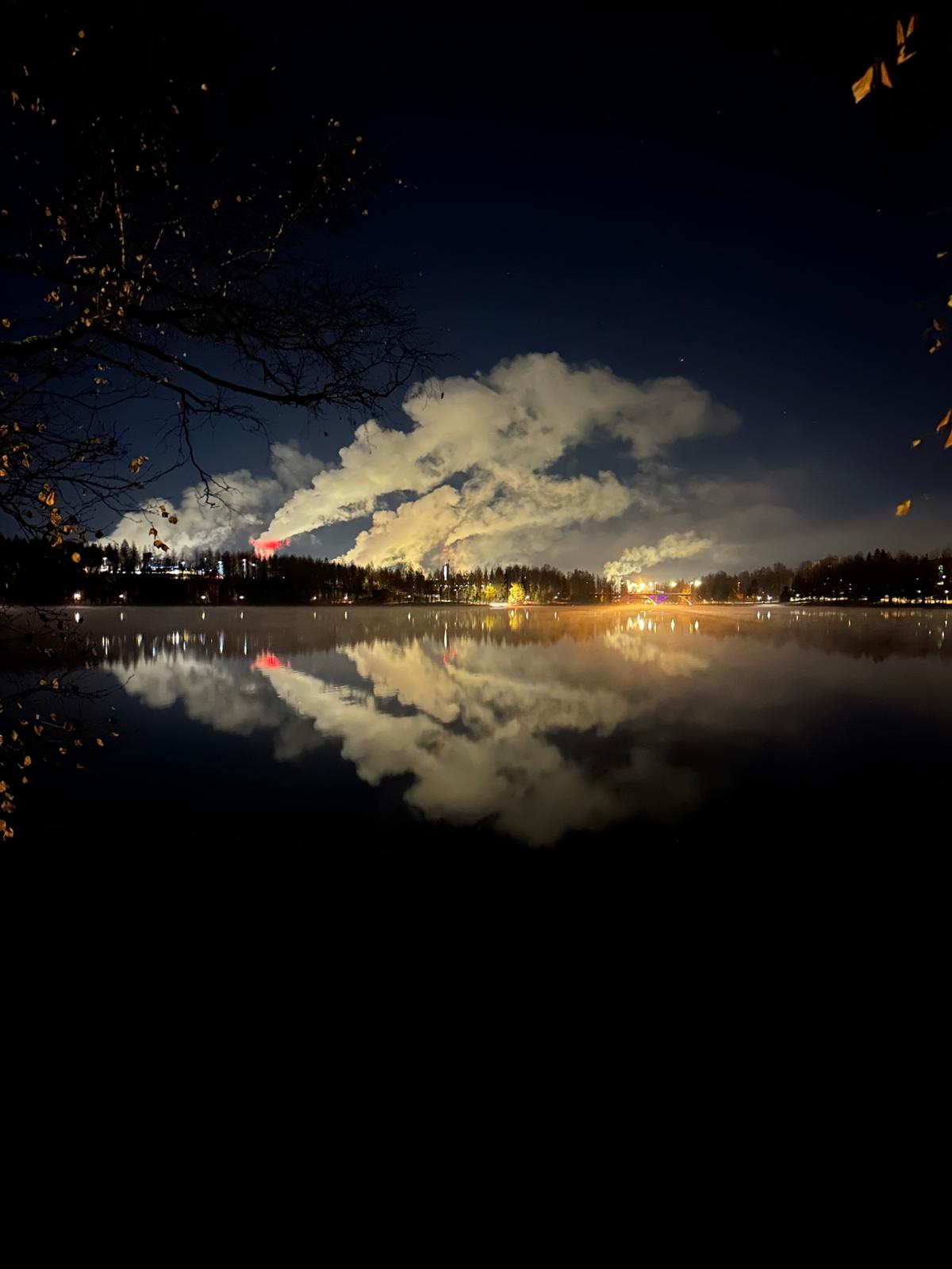 Factory lights reflected in the lake
