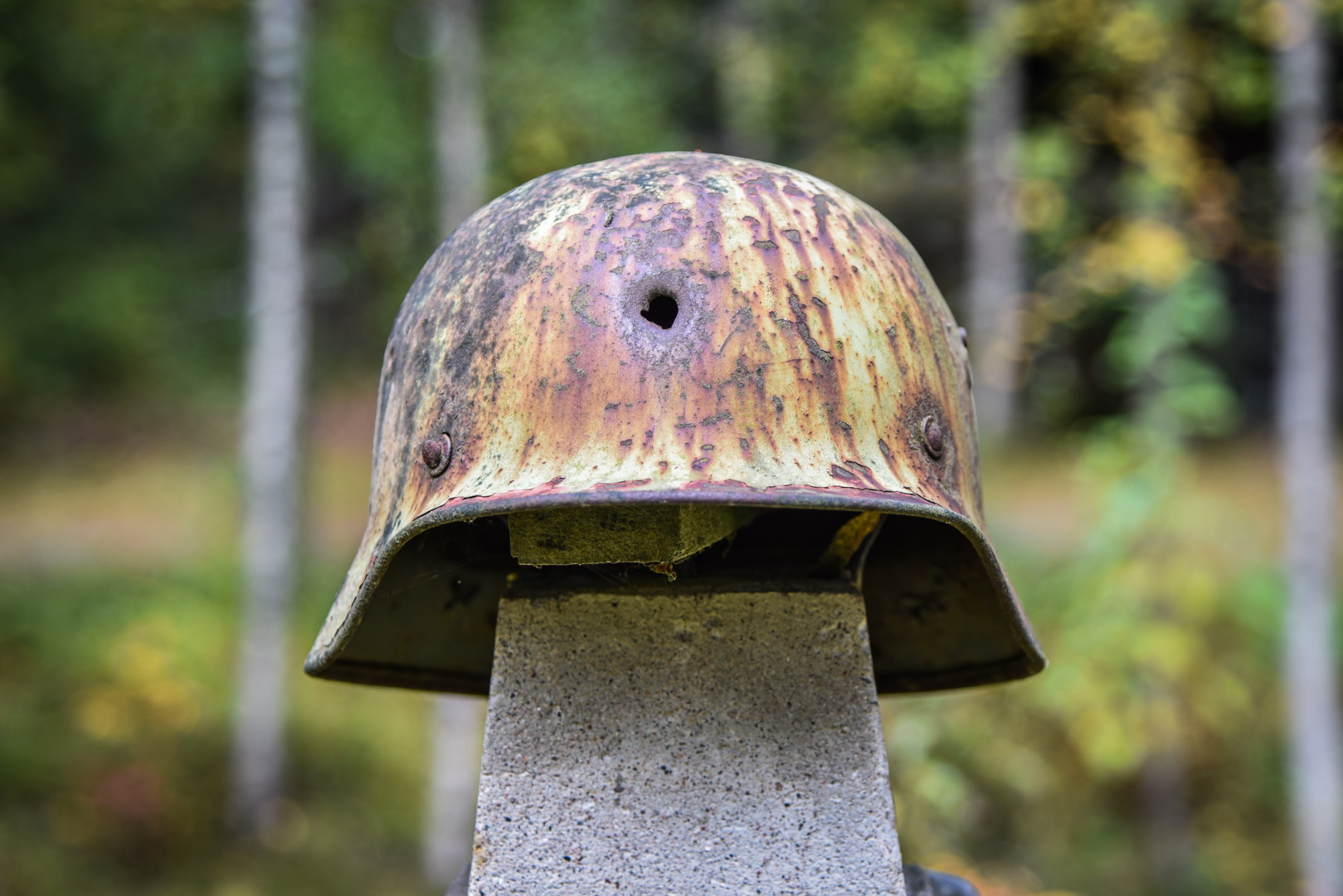 The Silent Warrior memorial, with a soldier’s helmet that has a bullet hole.